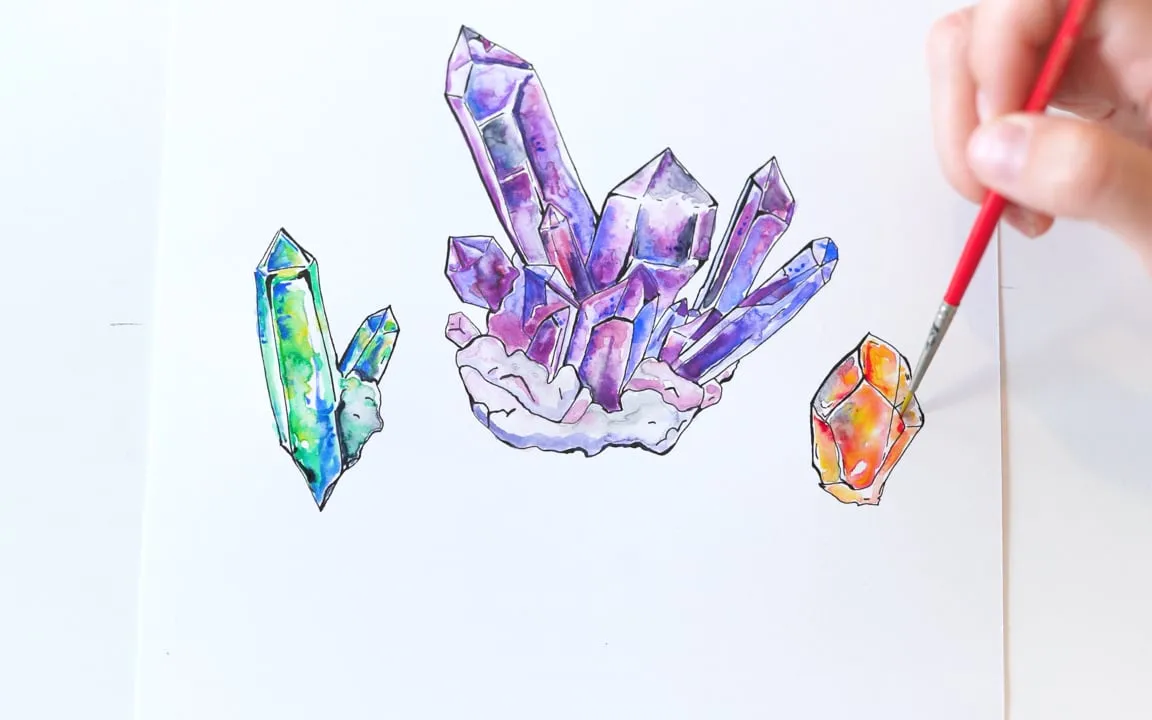 Purple and teal crystals painted in watercolor, from the Using Watercolors lesson